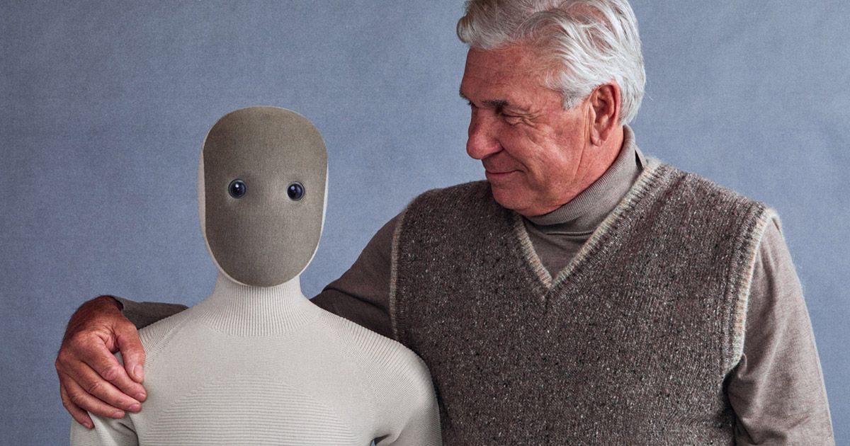 The 1X NEO humanoid home robot standing beside a person