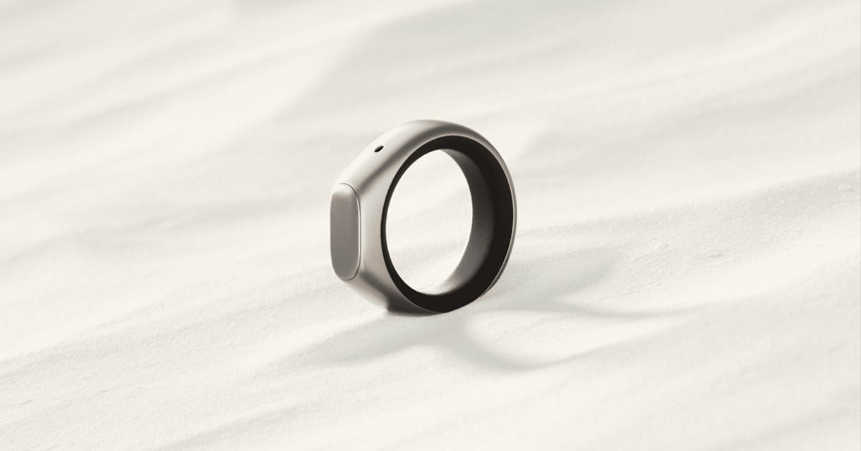 The Sandbar Stream voice ring resting on pale fabric