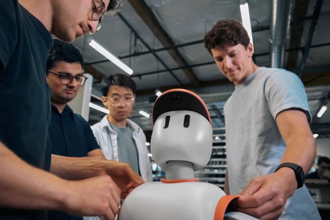 Engineers working around the Sunday home robot